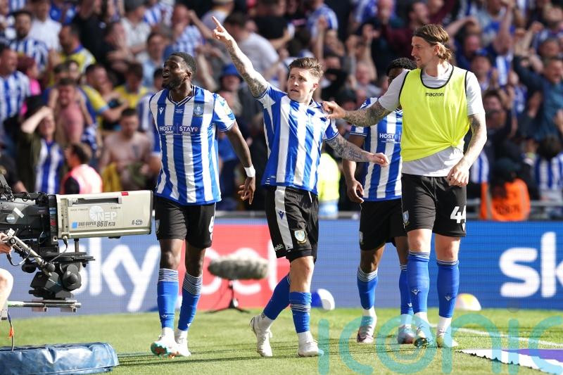 Josh Windass’ last-gasp winner against 10-man Barnsley earns Sheff Wed promotion