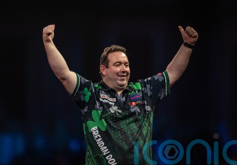 Michael van Gerwen’s World Matchplay defence ended by Brendan Dolan in opener