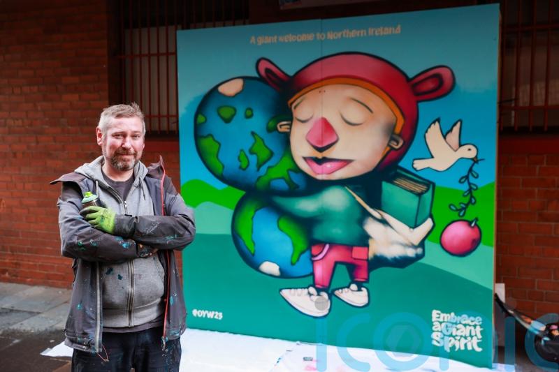 Mural showing &lsquo;young people will inherit the Earth&rsquo; unveiled in Belfast