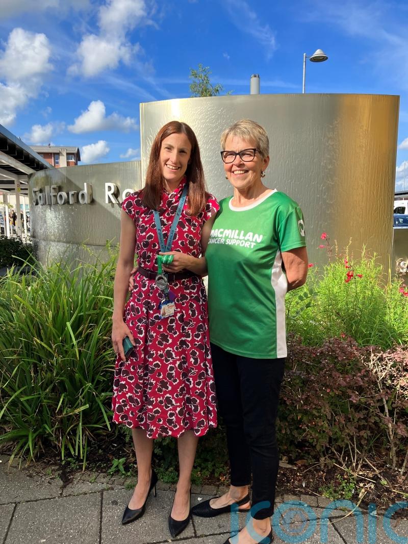 Woman who took on hike two months after brain haemorrhage hands medal to surgeon