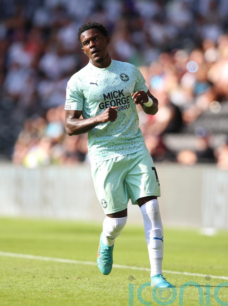 Peterborough fend off 10-man Blackpool’s fightback to climb up to fourth