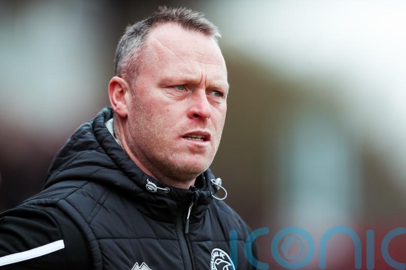 Michael Flynn frustrated after Swindon almost blow four-goal lead at Accrington
