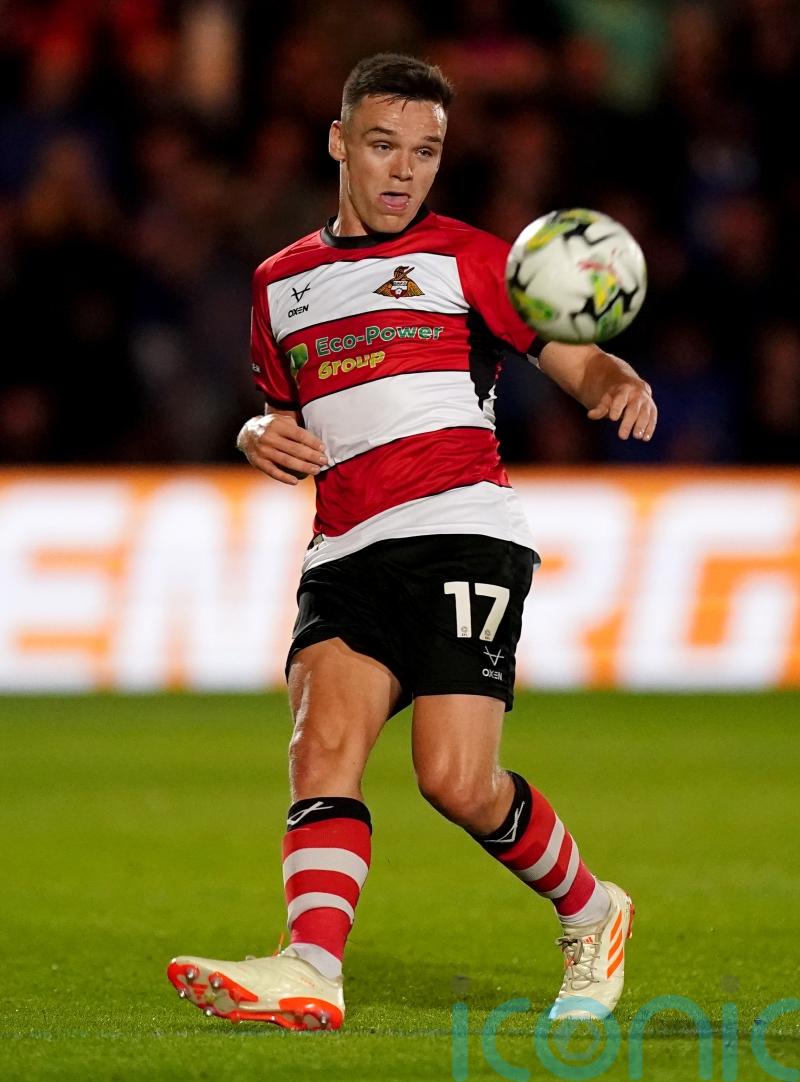Doncaster win again to dent Wrexham’s automatic-promotion hopes