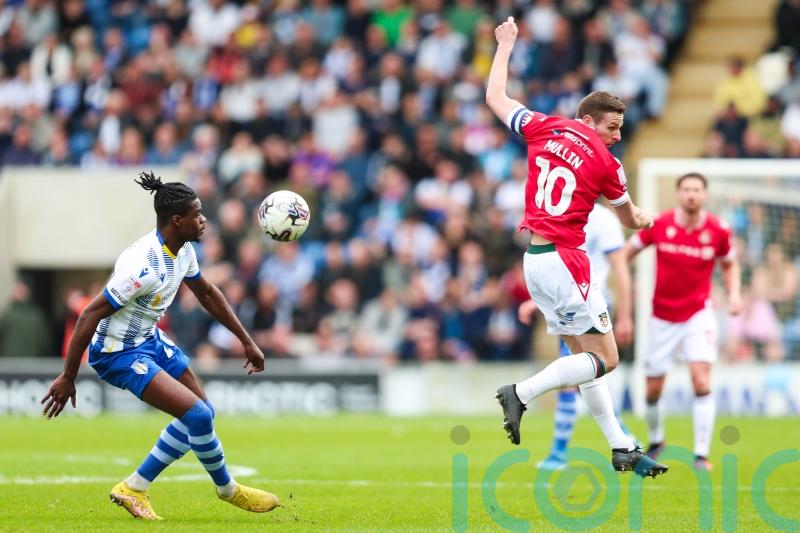 Paul Mullin scores 100th Wrexham goal in win at relegation-threatened Colchester