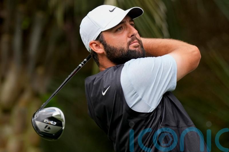 Scottie Scheffler five strokes ahead with weather forcing a Monday finish