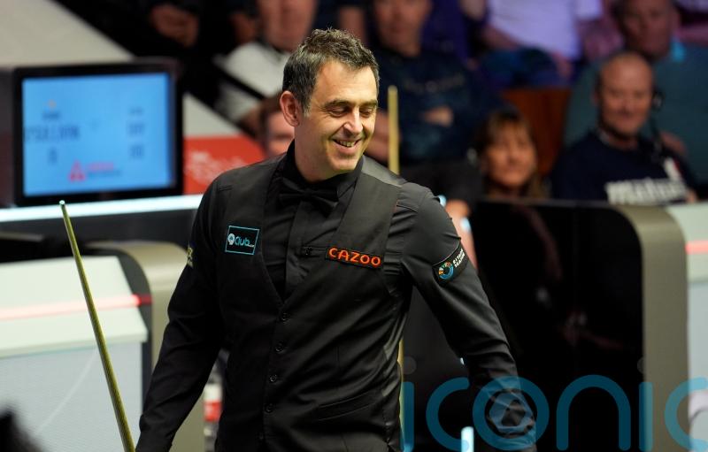 Ronnie O’Sullivan sees off Ryan Day to book Crucible quarter-final spot