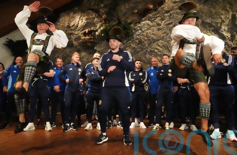 Moves like McGinn – Scotland midfielder throws some shapes on arrival in Germany