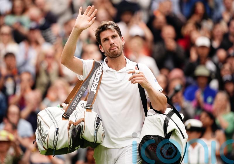 Cameron Norrie beaten by Alexander Zverev after 32-point third-set tie-break