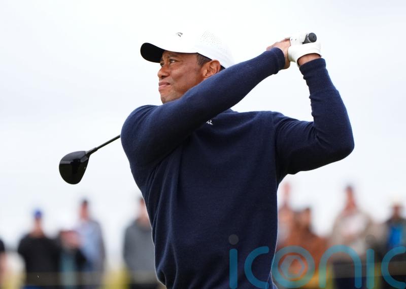 Struggling Tiger Woods set to miss Open cut as Shane Lowry moves into lead