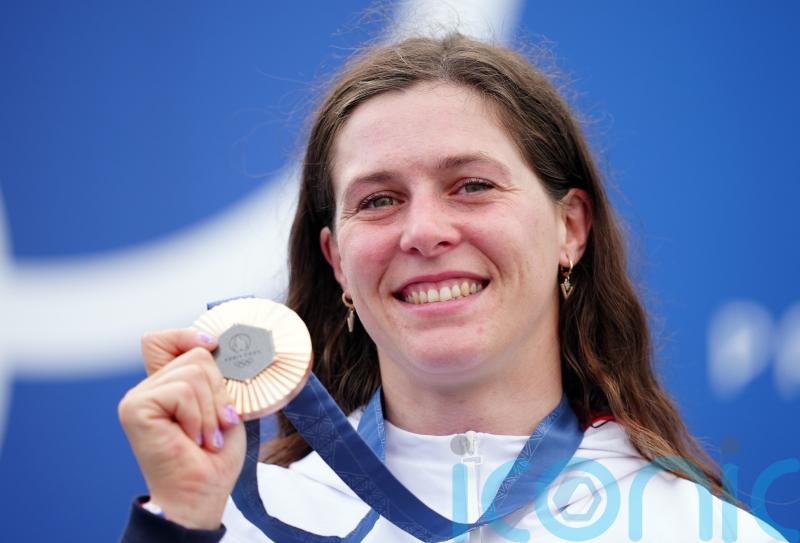 Kimberley Woods ‘buzzing’ after kayak bronze as Olympics goes into third day