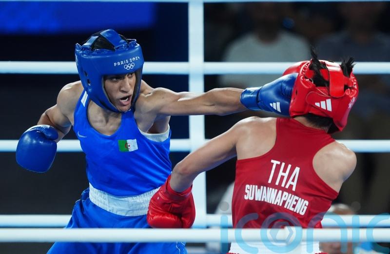 Algerian fans celebrate as Imane Khelif books place in women’s 66kg final