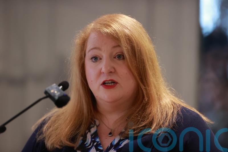 Cost of school phone pouch scheme criticised by Long