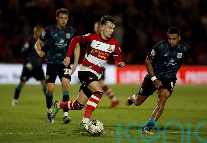 Kyle Hurst brings joy to Grant McCann in Doncaster’s win over Bradford