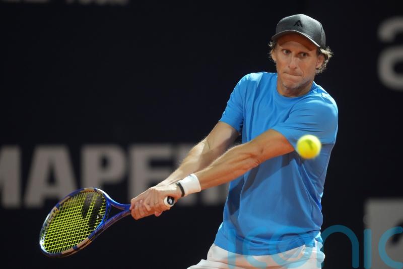 Diego Forlan’s pro tennis debut ends in defeat for former Uruguay forward