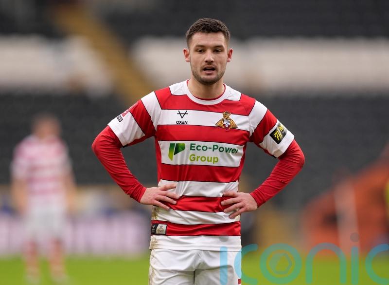 Luke Molyneux at the double as Doncaster beat Barrow to boost promotion push