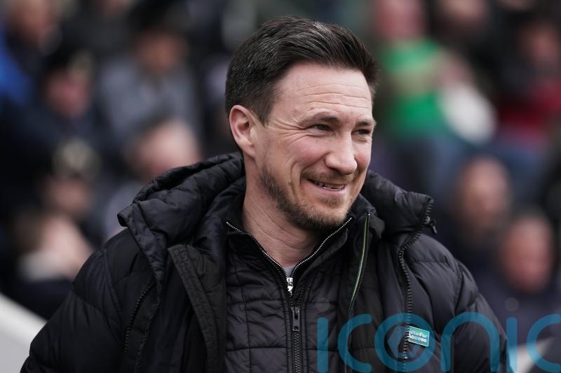 Charlie Whitaker catches Stuart Maynard’s eye as Notts County climb to second