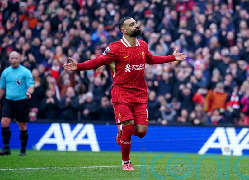 Liverpool survive late scare against Wolves to move seven points clear