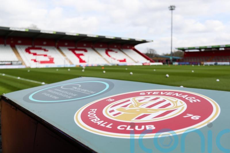 Ten-man Burton claim much-needed win at Stevenage in fight for survival