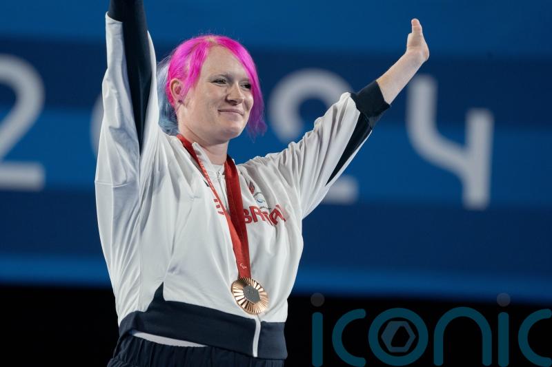 Archer Jodie Grinham delighted to prove motherhood doesn’t end sporting careers