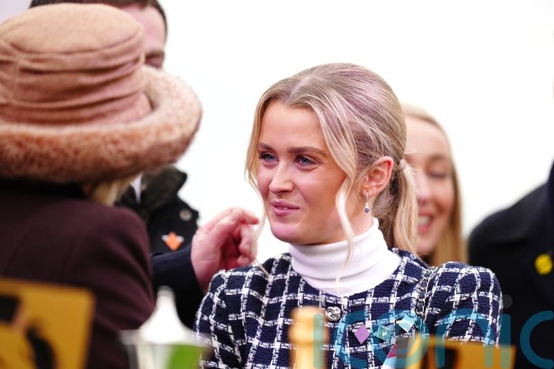 Queen comforts girlfriend of late jockey at Cheltenham Festival
