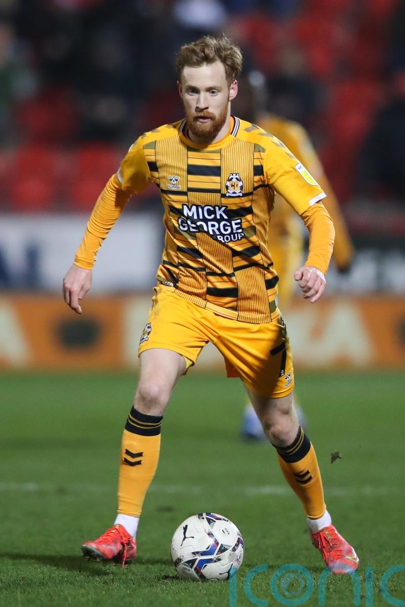 Cambridge’s dramatic win over Huddersfield keeps survival hopes alive