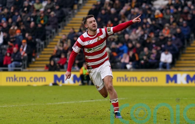 Luke Molyneux scores hat-trick at Tranmere to boost Doncaster’s promotion hopes