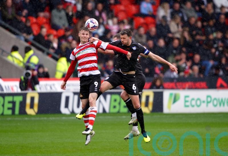 Doncaster crowned League Two champions as Rob Street brace downs Notts County