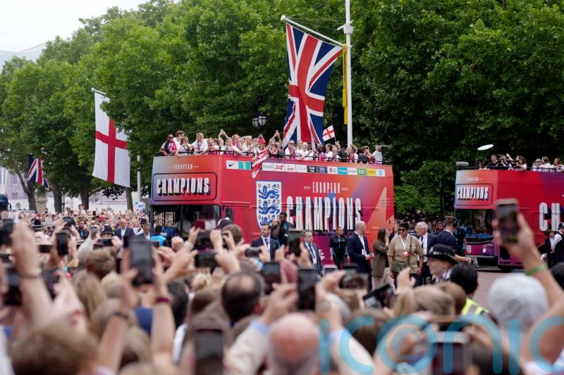 European champions England given a hero&rsquo;s welcome outside Buckingham Palace