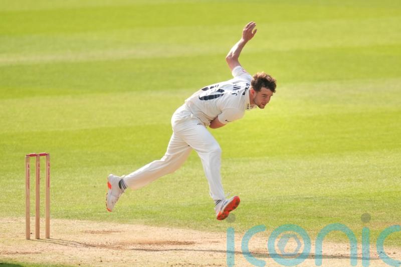Tom Lawes helps Surrey fight back against Warwickshire