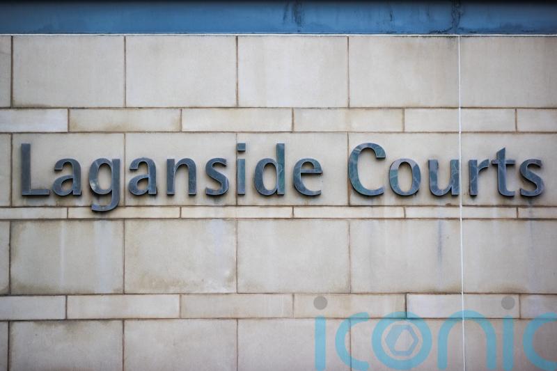 Four refused bail after appearing in Belfast court charged over tourist attack