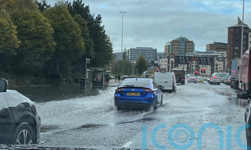 Police urge caution after heavy rain leaves some roads across Belfast flooded