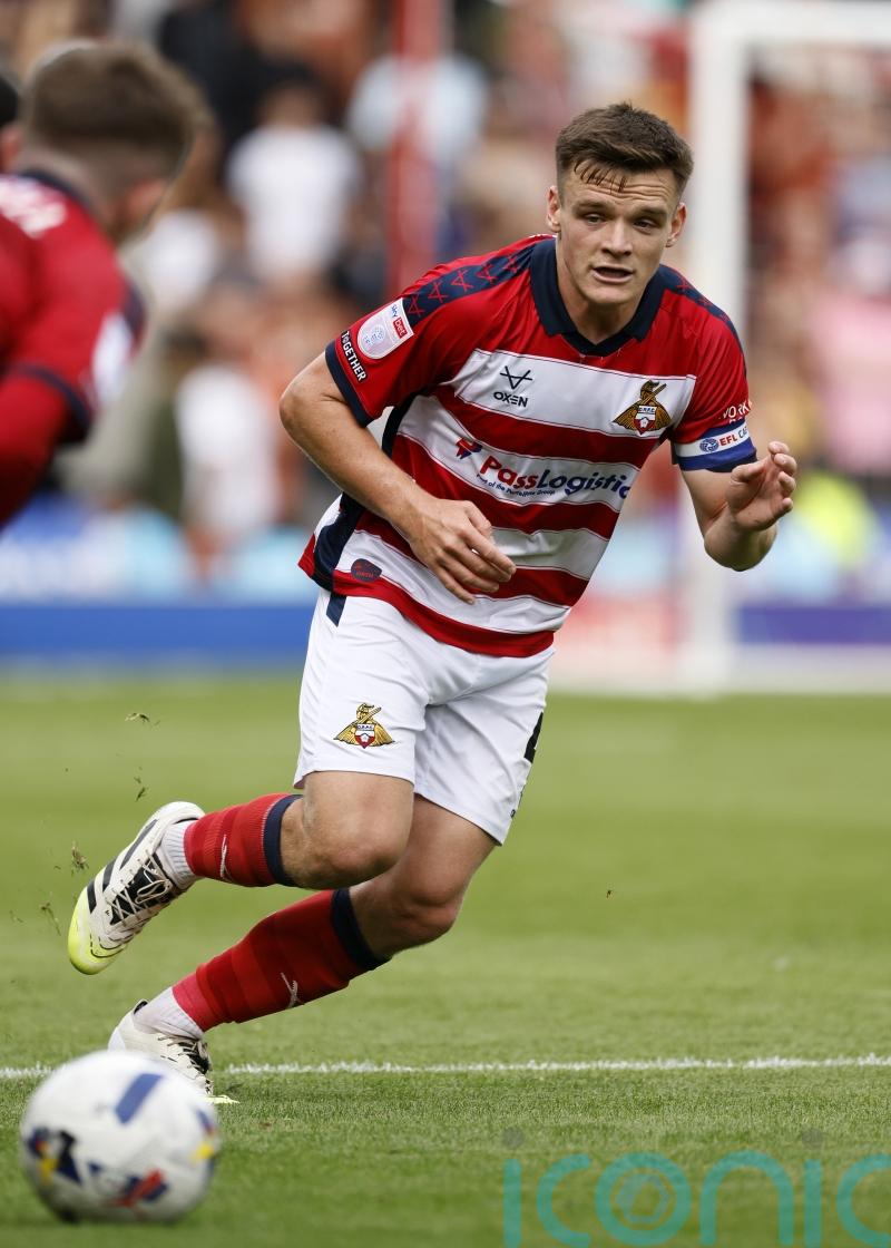 Owen Bailey’s stoppage-time winner sends Doncaster through to round two