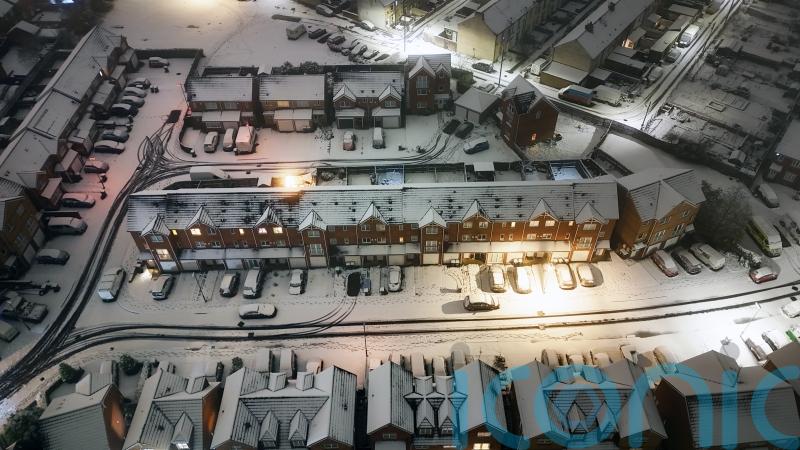 Snow and ice warnings come into force amid &lsquo;tricky travel conditions&rsquo;