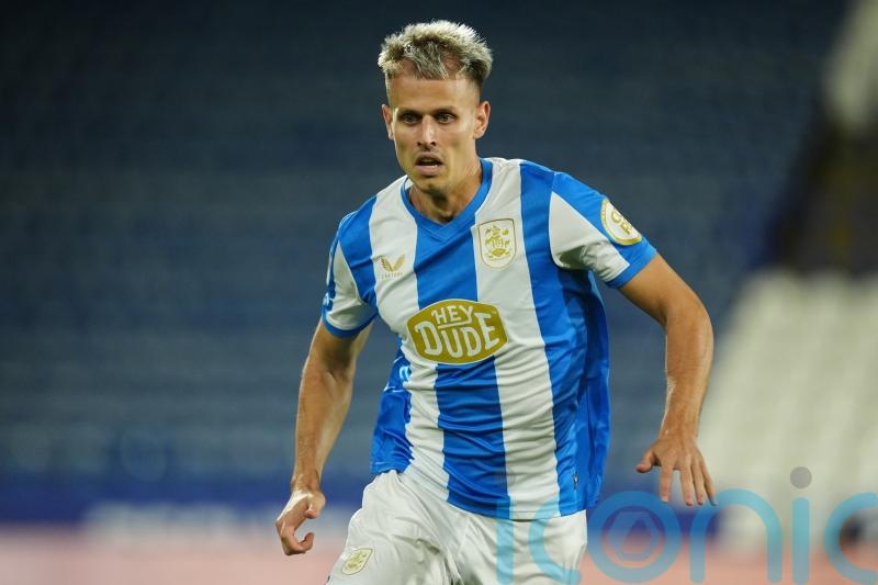 Huddersfield blow away Mansfield with three early goals