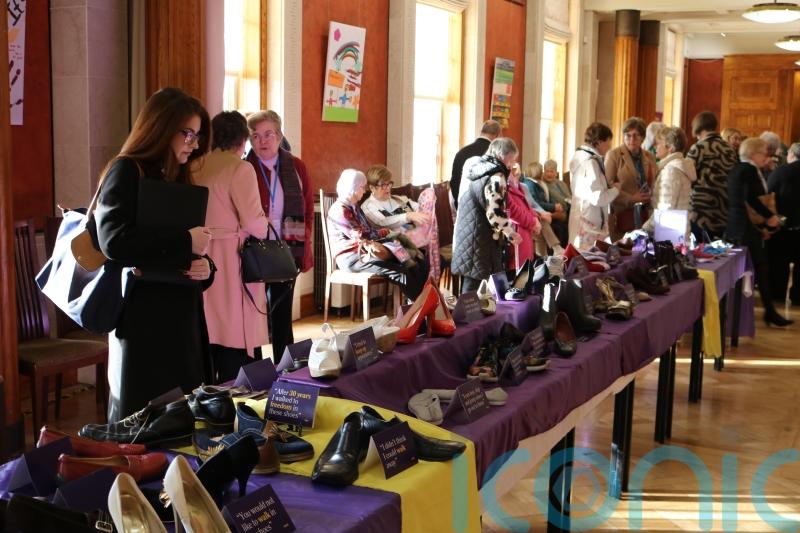 Shoes of domestic abuse survivors displayed at Stormont