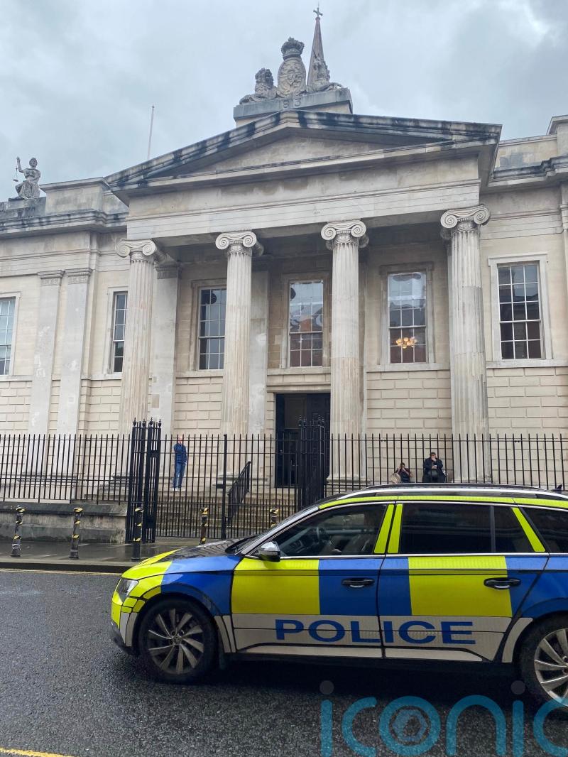 Man in court accused of punching and spitting on police