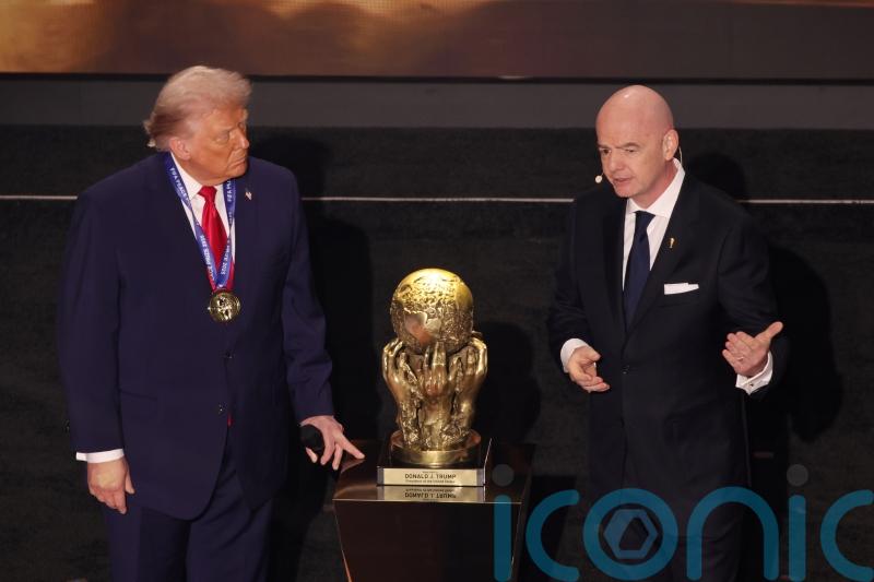 Donald Trump awarded inaugural FIFA peace prize at World Cup draw