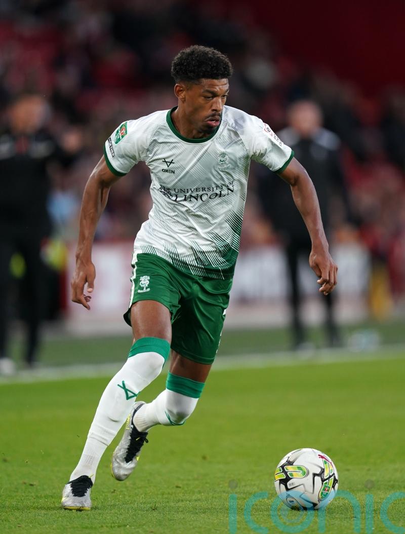 Reeco Hackett scores twice as in-form Lincoln see off Barnsley