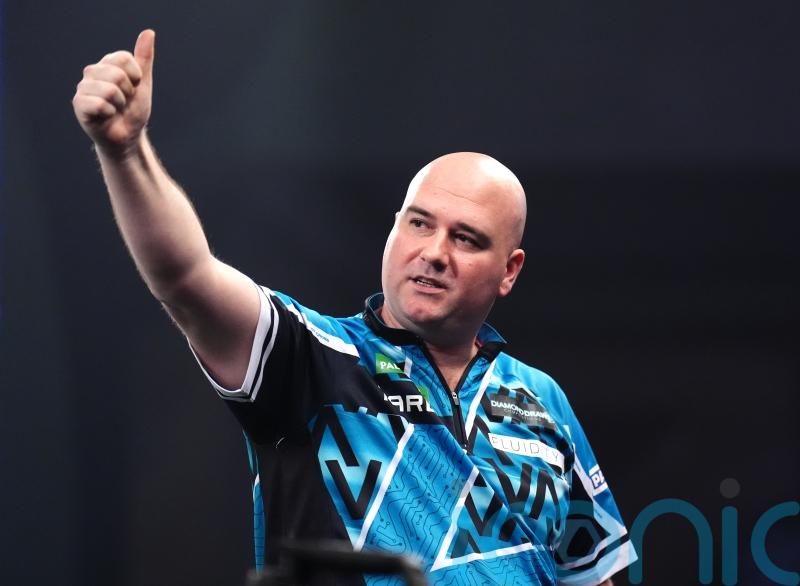 Rob Cross thrashes Damon Heta to set up Luke Littler showdown in last 16