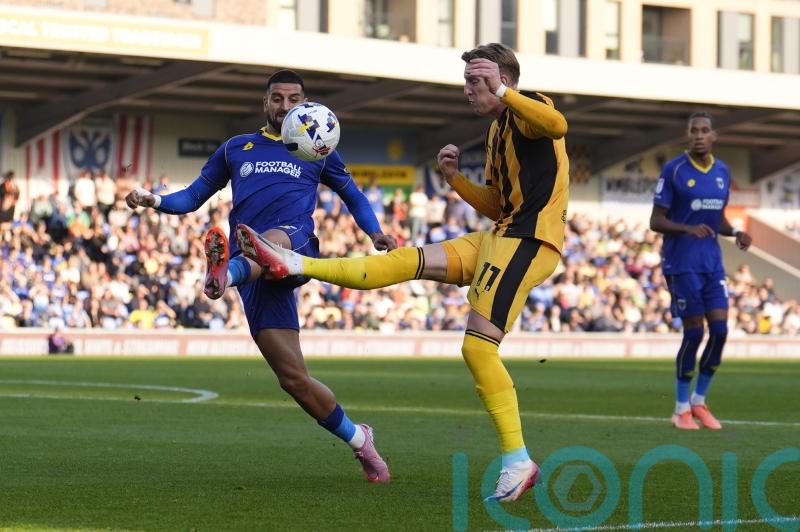 Omar Bugiel bags quick brace as Wimbledon and Barnsley draw in six-goal thriller