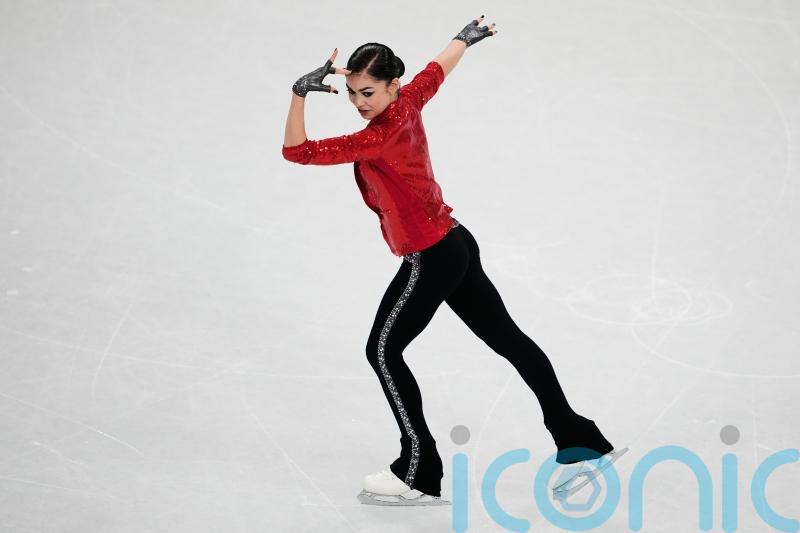 Teen Russian figure skater with controversial coach makes Winter Olympics debut