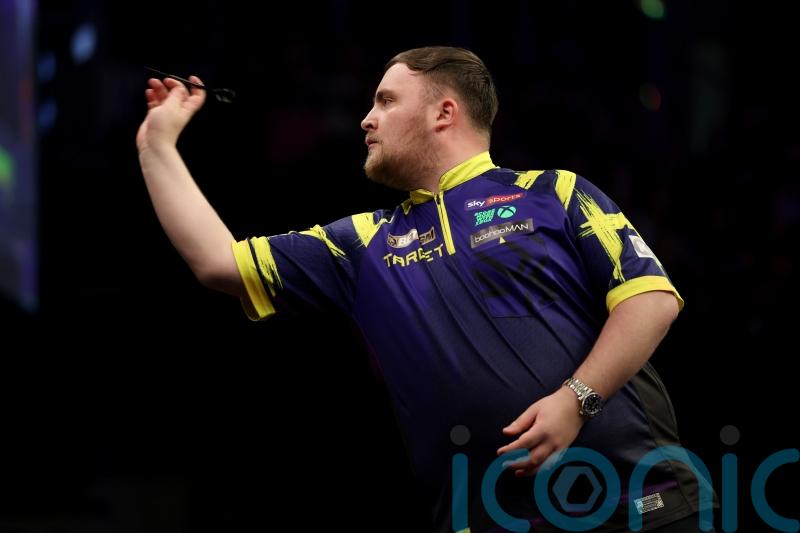 Luke Littler stays on track to defend UK Open title by beating Gary Anderson