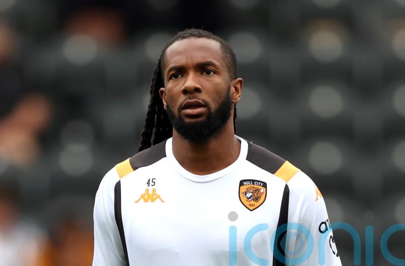 Luton edge five-goal thriller against Exeter to keep play-off hopes alive