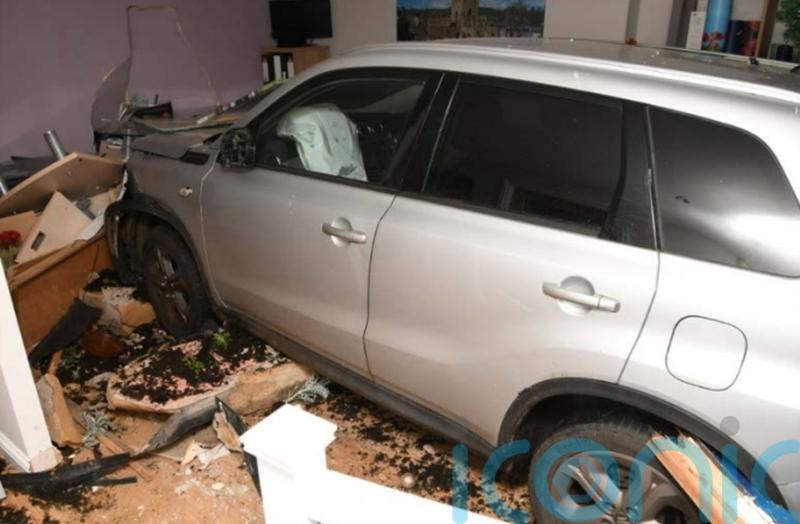 Woman whose ex tried to murder her by crashing into funeral parlour wins payout