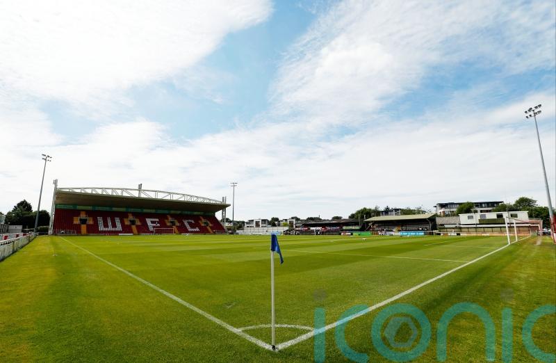 Altrincham defy double dismissal to earn draw with Woking