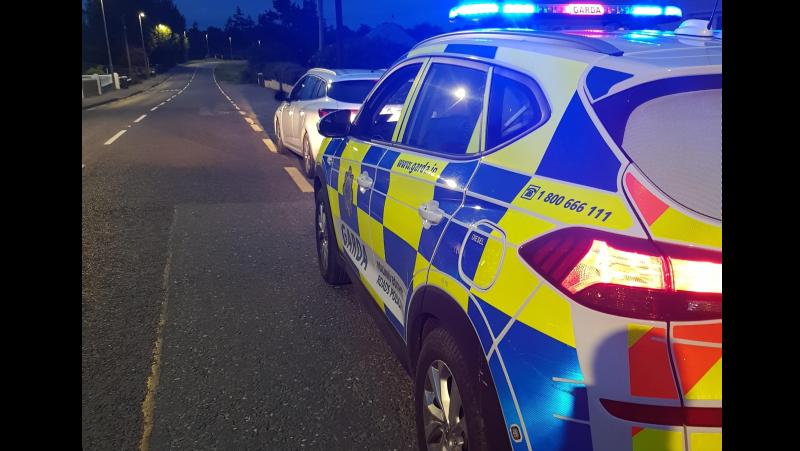 Distracted taxi driver 'completely ignores stop sign' and almost hits Garda car