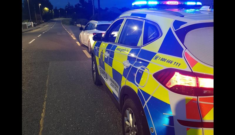 Distracted taxi driver 'completely ignores stop sign' and almost hits Garda car