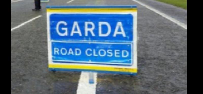 Garda closed road sign