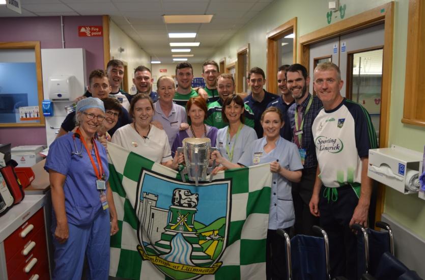 The victorious Limerick Hurlers visit the children and staff in Temple Street Children's University Hospital with the Liam McCarthy Cup
