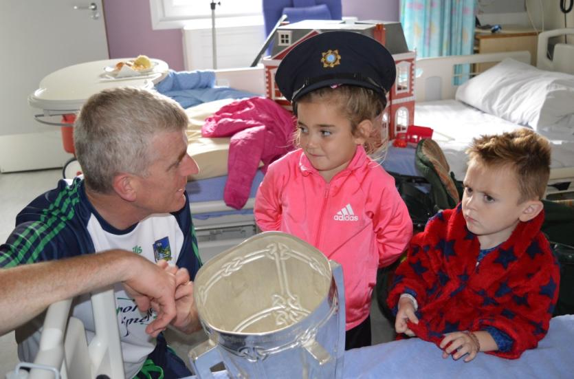 John Kiely with three-year-old John Paul and five-year-old Nora McDonagh from Dundalk